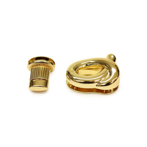 Knot - turning lock, gold colour