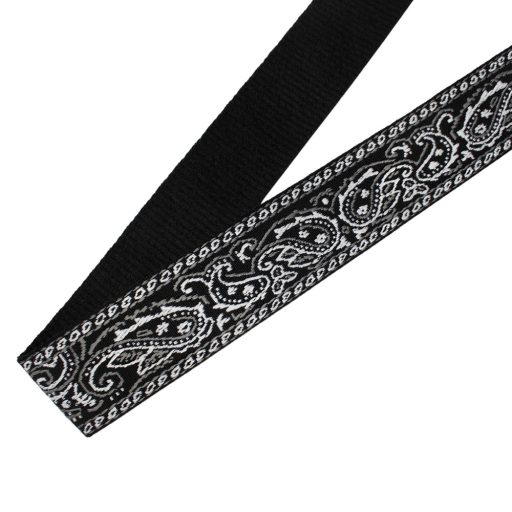 Pink bag strap with leather adjustments.