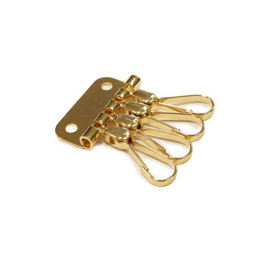 Key holder, for Four Pieces, Gold